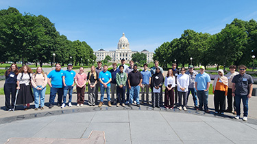 Students from the 2026 Civil Engineering Student Worker Program gather infront of the Minnesota state capitol